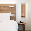 Wood sconce from curved ash veneer