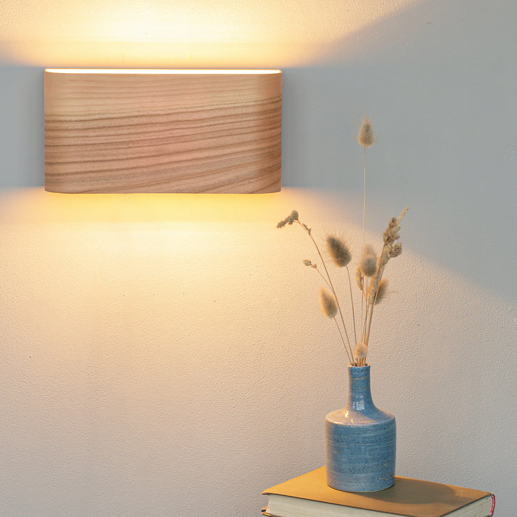 LED wall lamp from curved cherry veneer