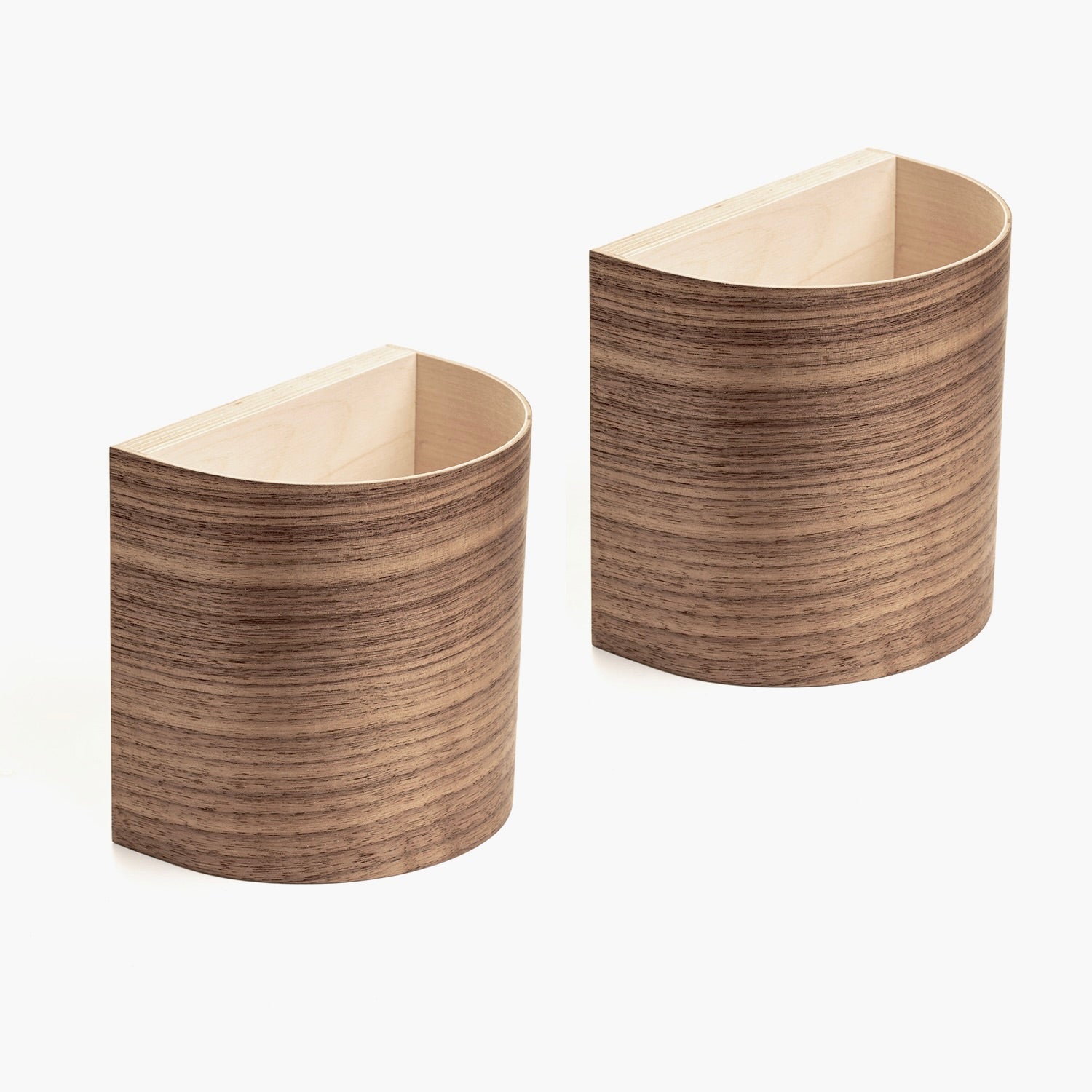 Cordless accumulator wall sconce pair on a wall
