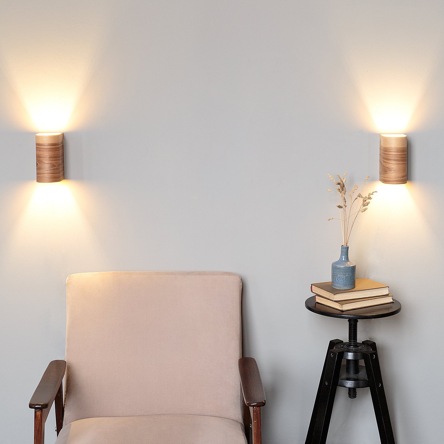 Rechargeable wall sconces set of 2 in ash on a wall