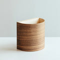 Battery operated walnut wall sconce on a wall
