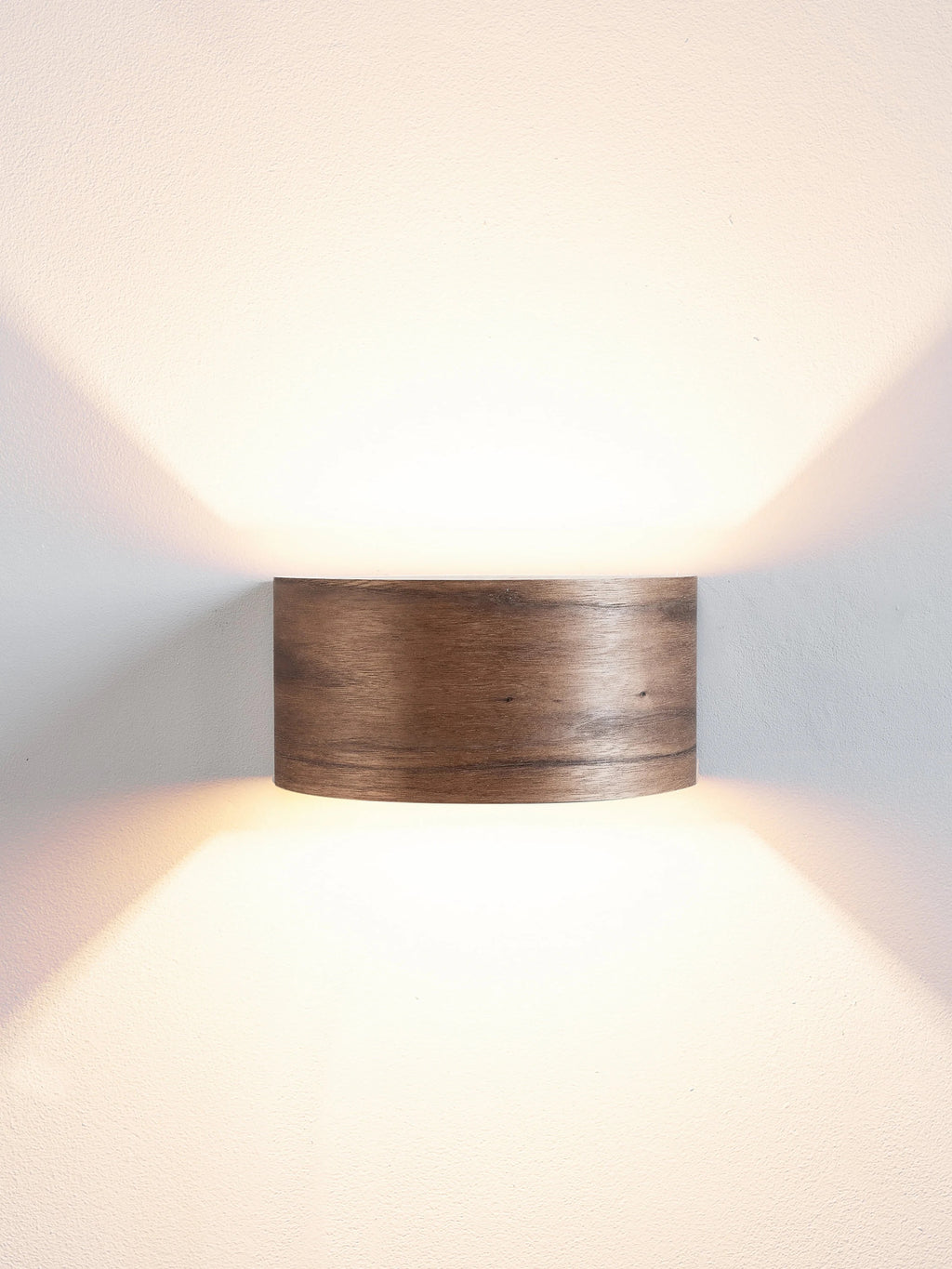 Walnut battery sconce close-up
