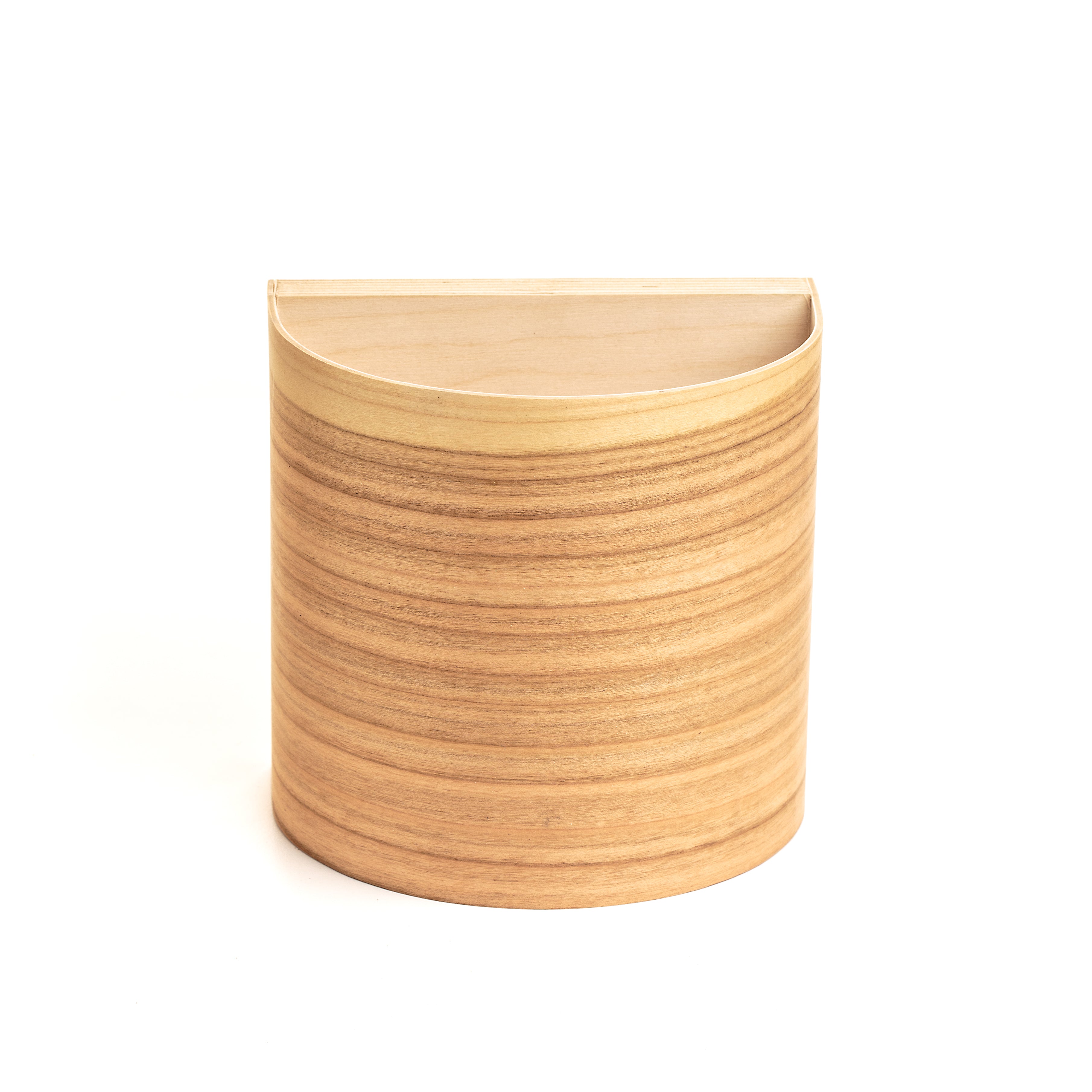 Cherry wall sconce close-up showing warm grain