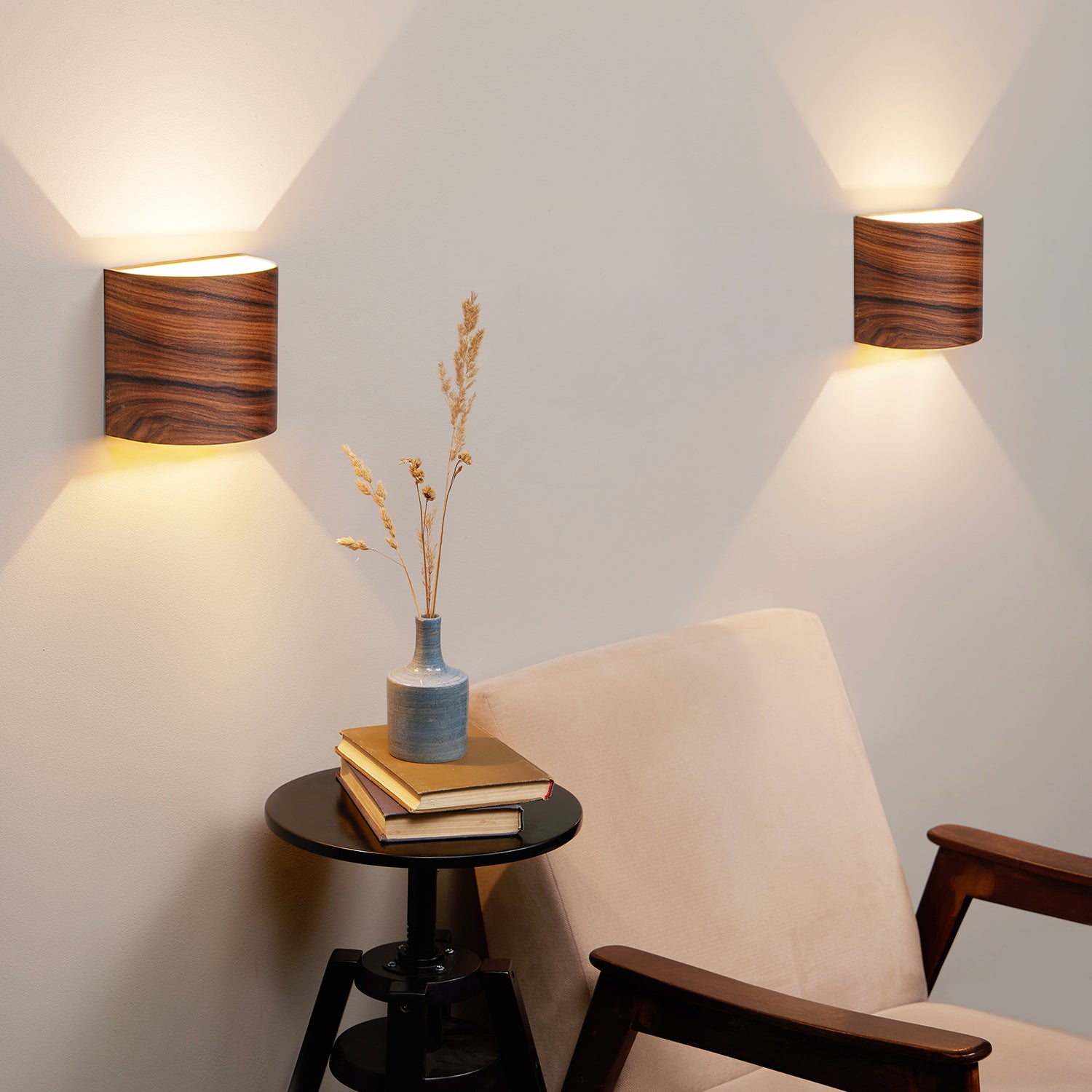 Set of 2 rosewood wall sconces on a wall