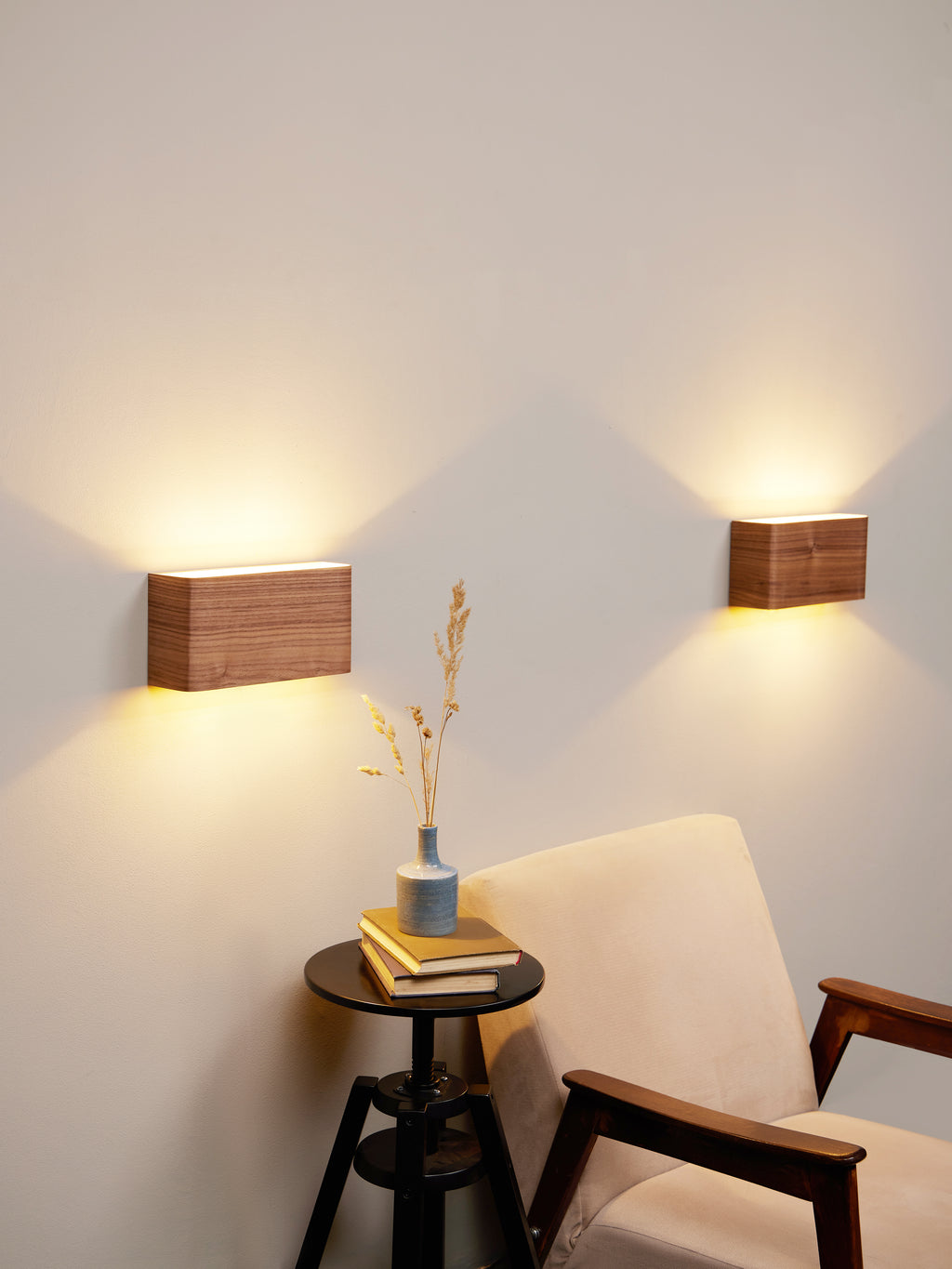 Pair of dark walnut wall sconces, side view
