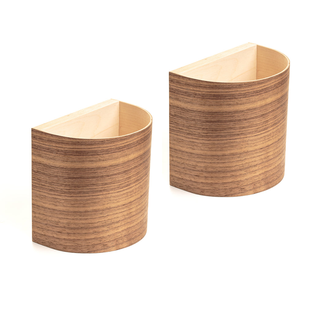 Walnut wall lamps with warm glow