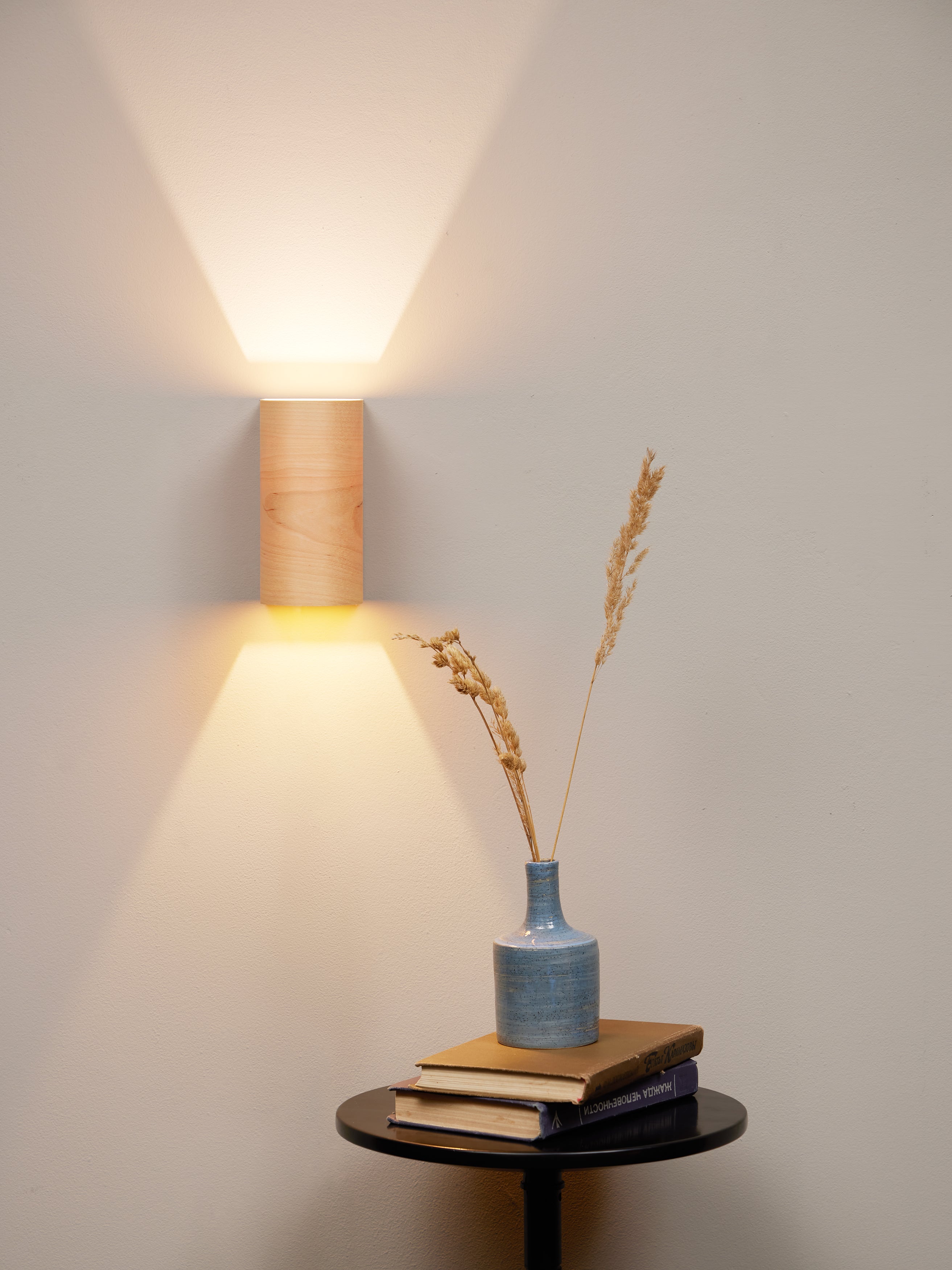 Matching birch wall sconces, front view