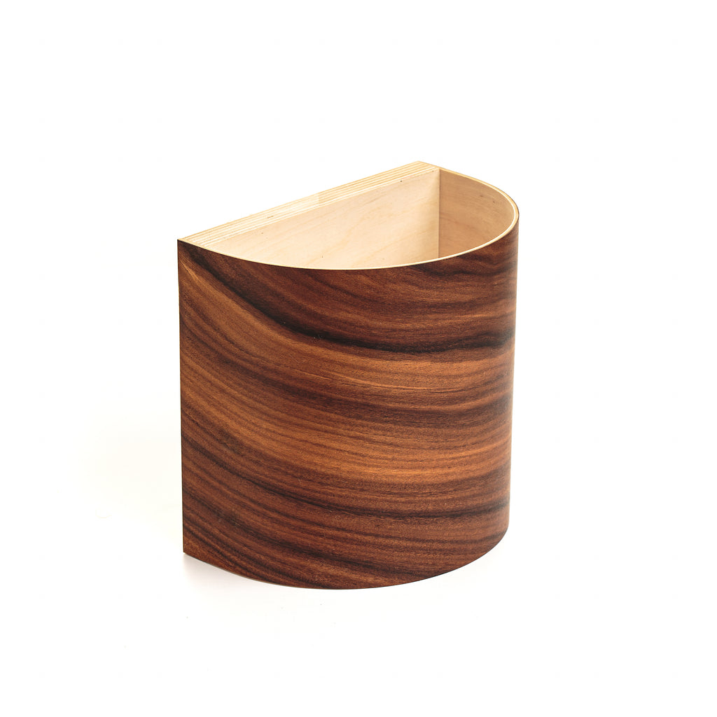 Rosewood wall sconces in a living room