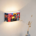 Hand-painted two-cats wall lamp mounted on a wall
