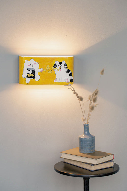 Cat wall sconce close-up detail