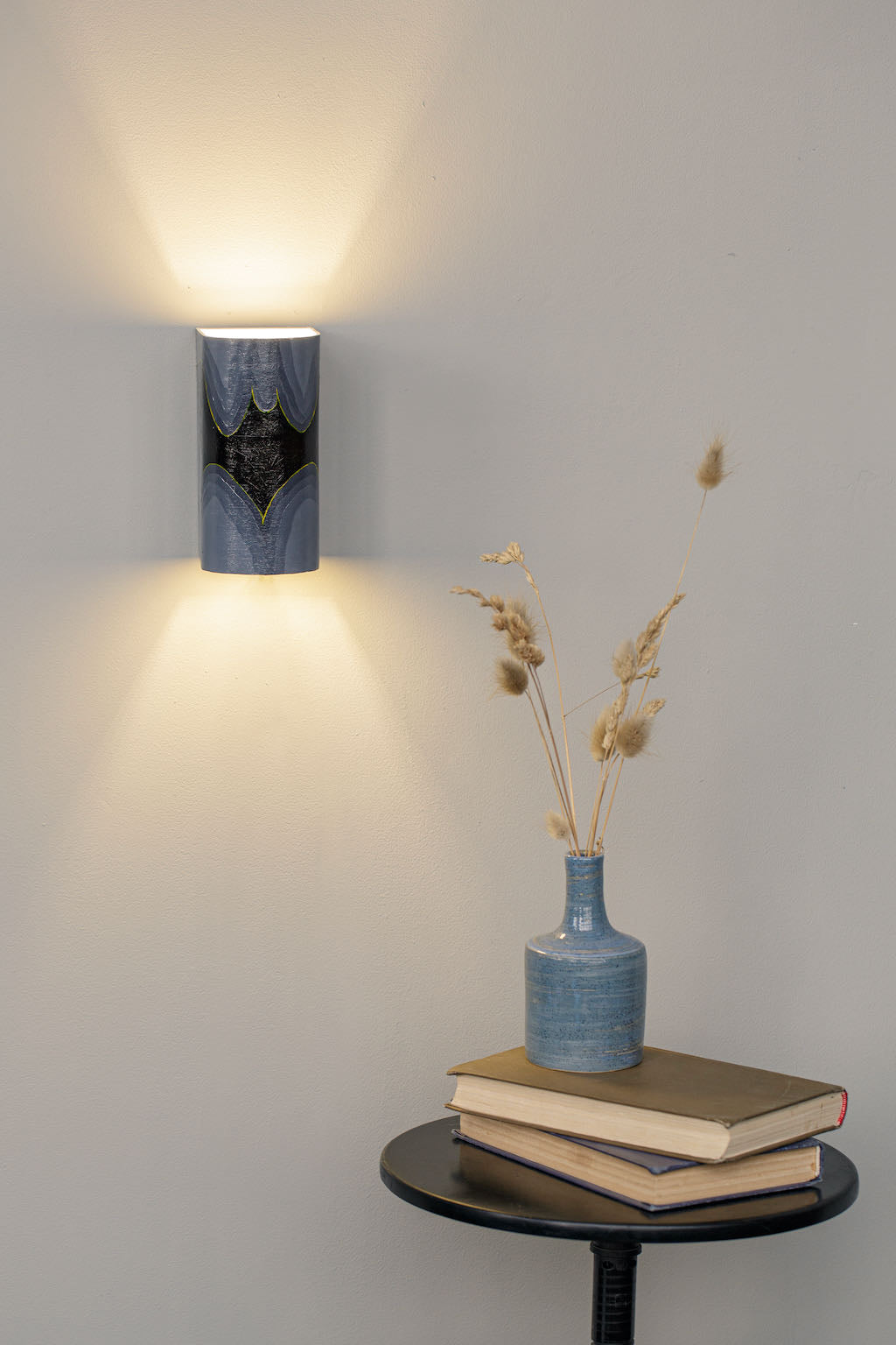 Artistic decorative wall lamp, side view