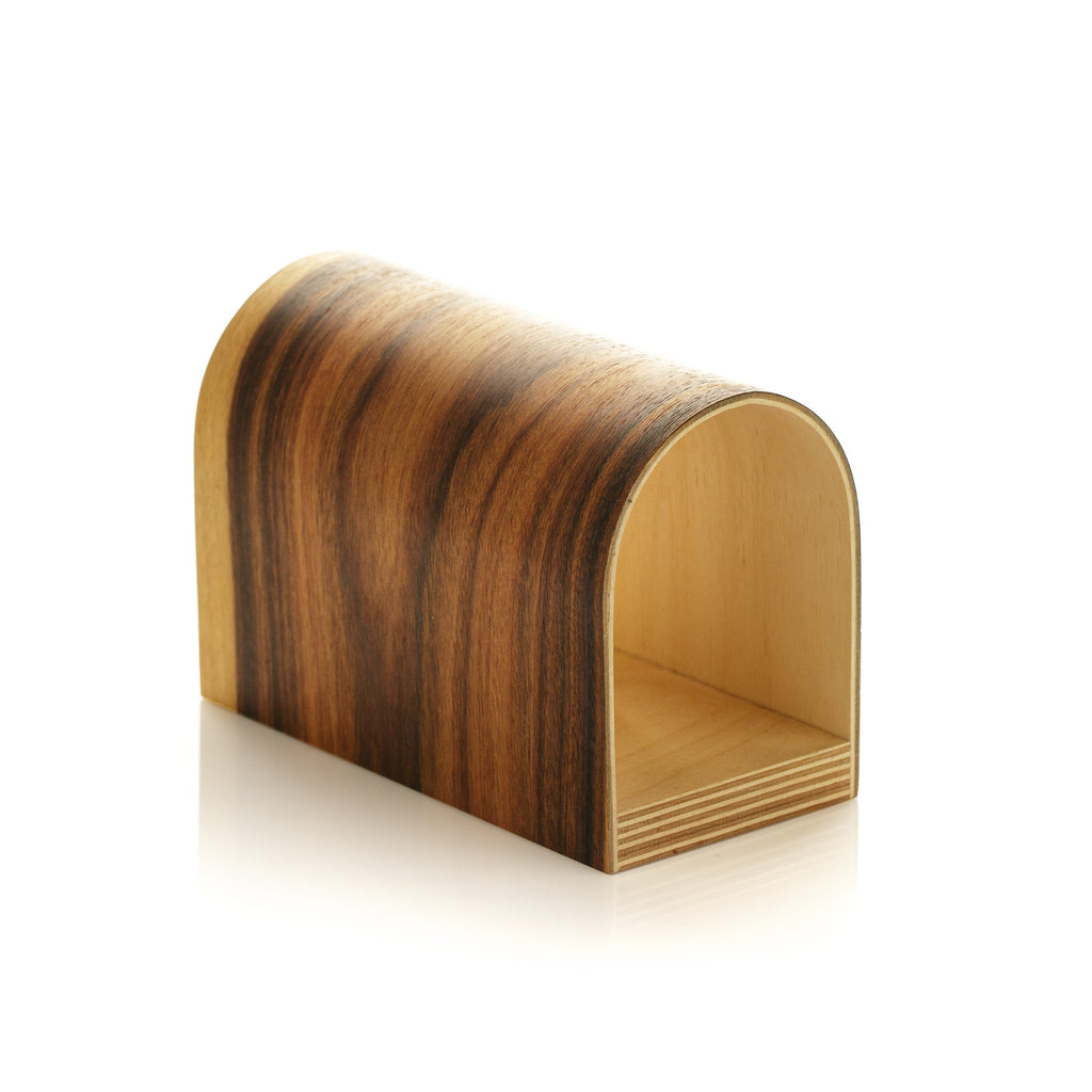 Rosewood wall lamp mounted indoors