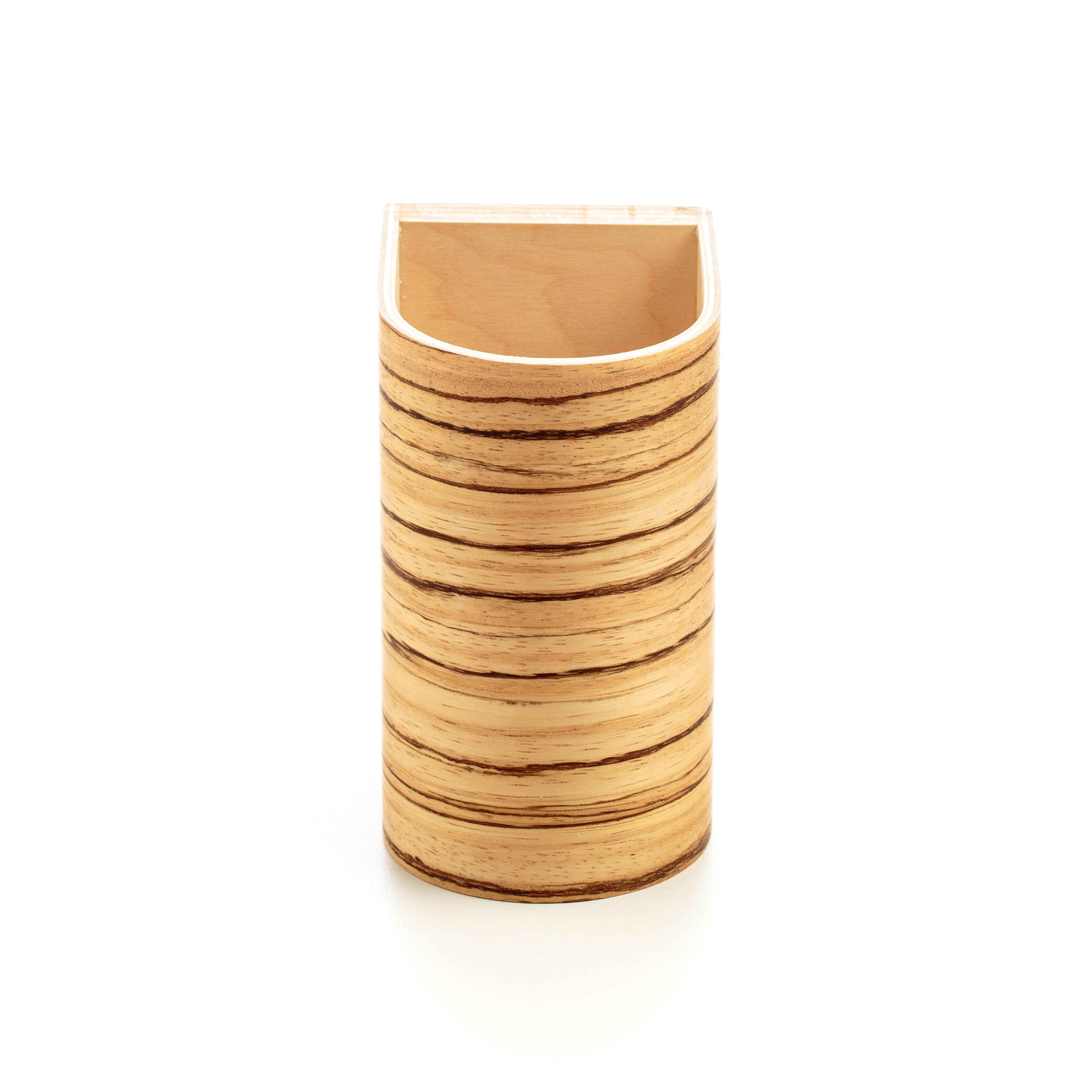 Zebrano wall sconce close-up showing bold stripes