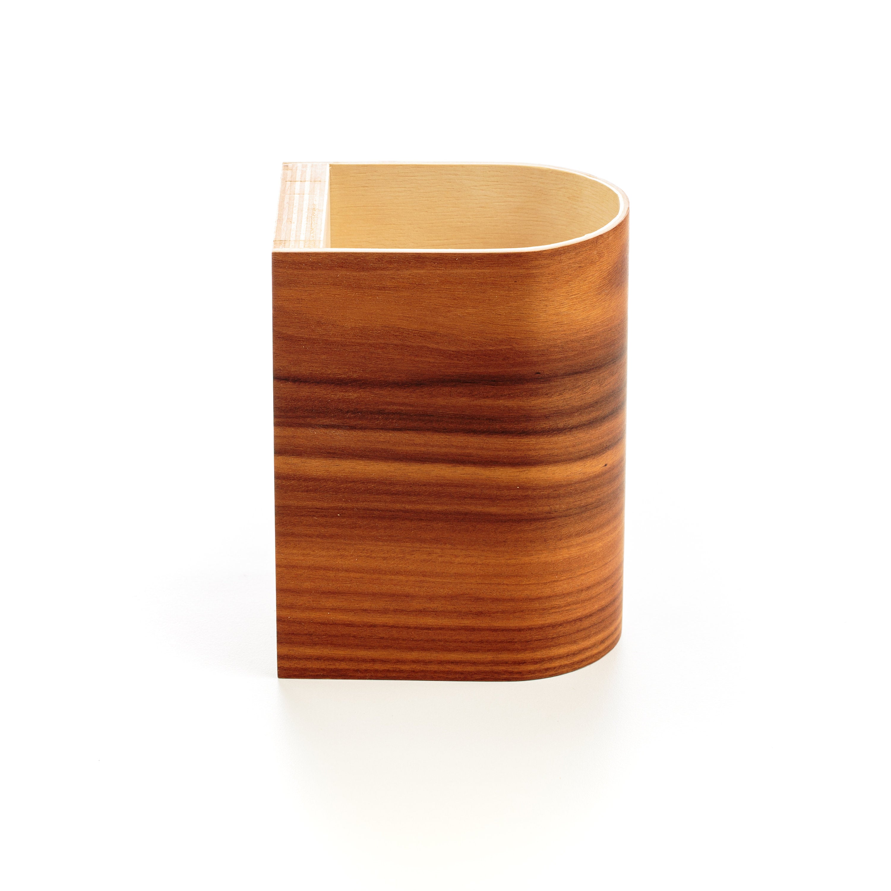 Light rosewood wall sconce close-up showing grain