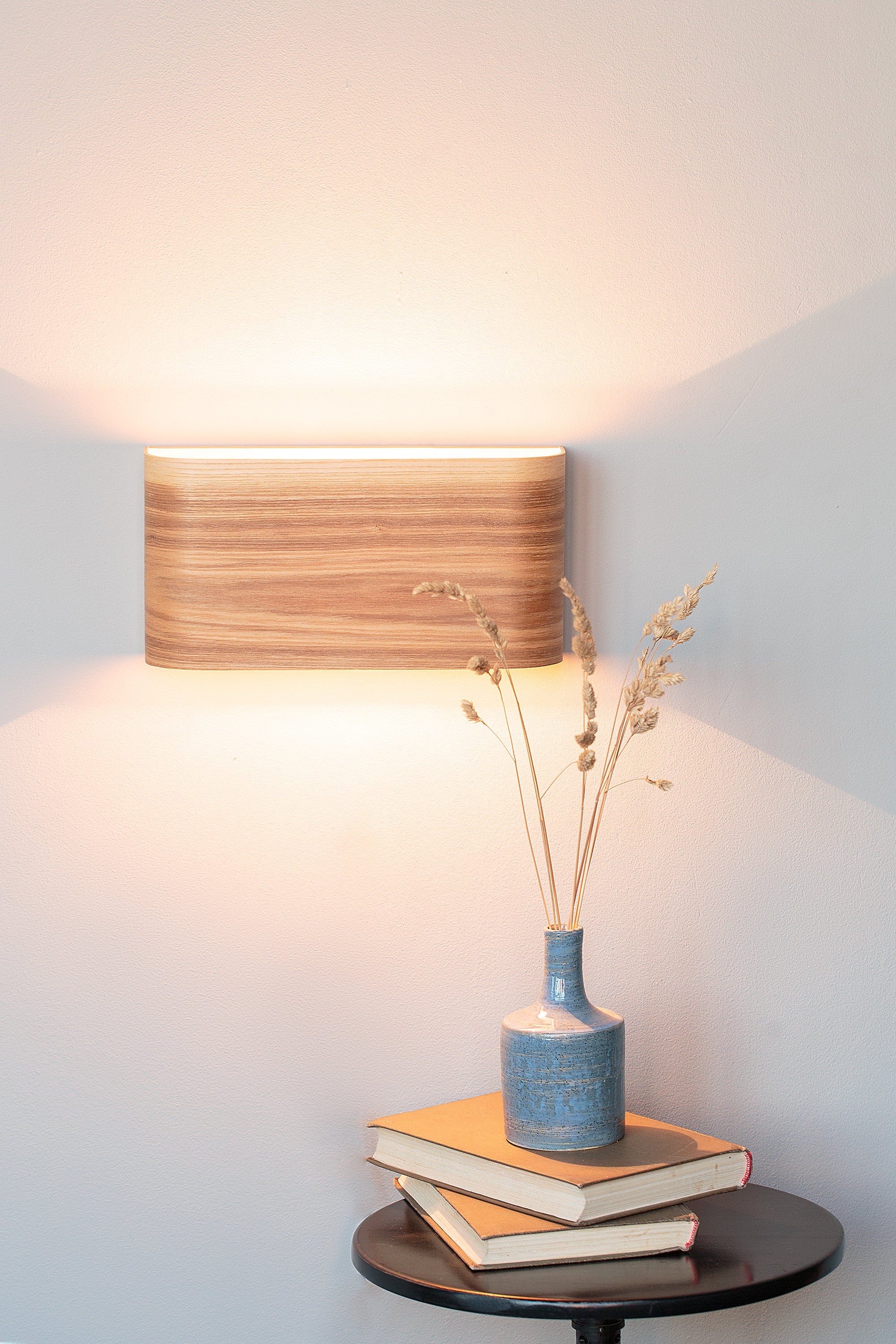 Ash wall lamps lit at night
