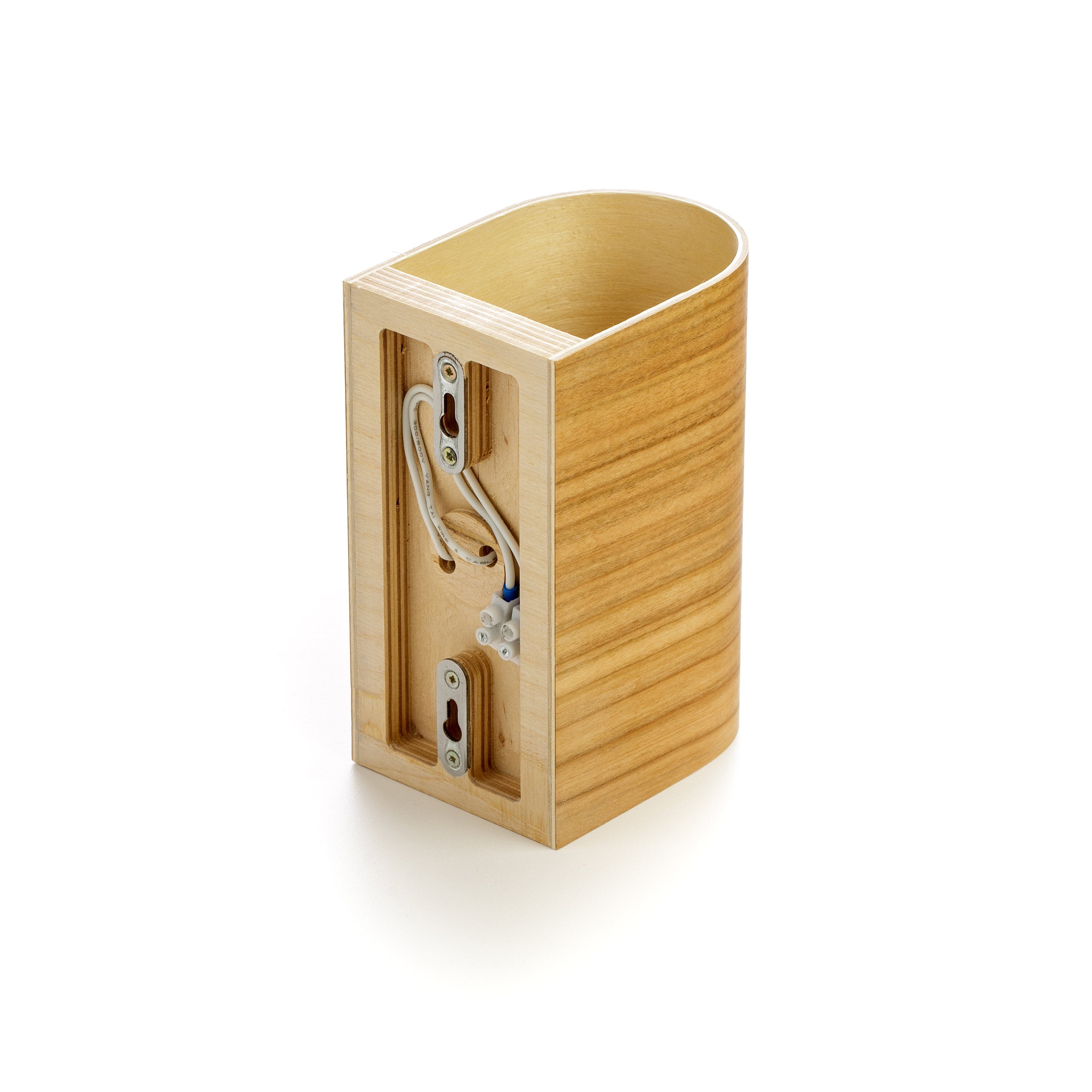 Modern wood wall sconce providing warm decorative lighting